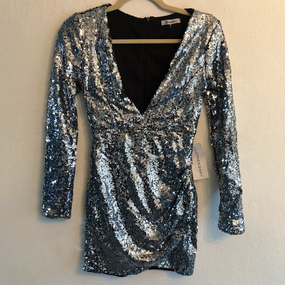 Xtaren Dresses & Skirts - NWT Xtaren Silver Sequin Long Sleeve Mini Dress